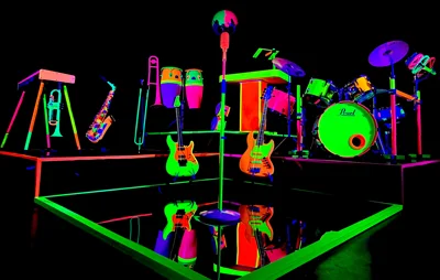 Get ready for a neon carnival with this wedding band's glow-in-dark instruments